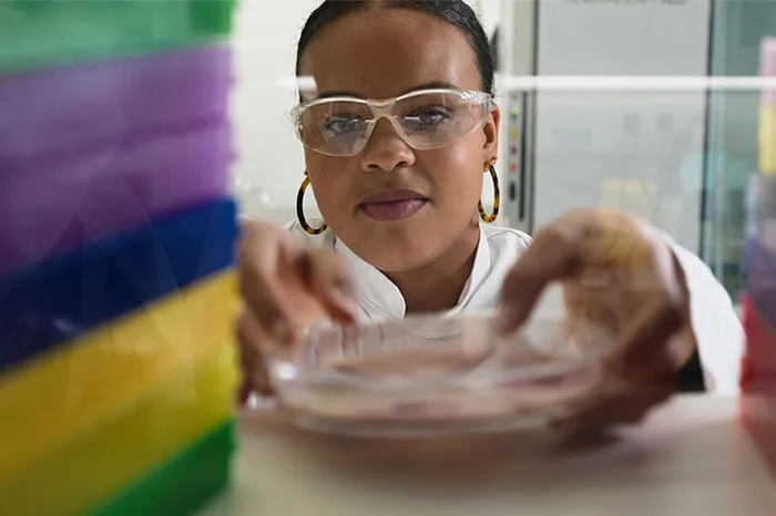 Scientist or researcher working in a laboratory, representing PrecisionBiotics' data-driven scientific approach